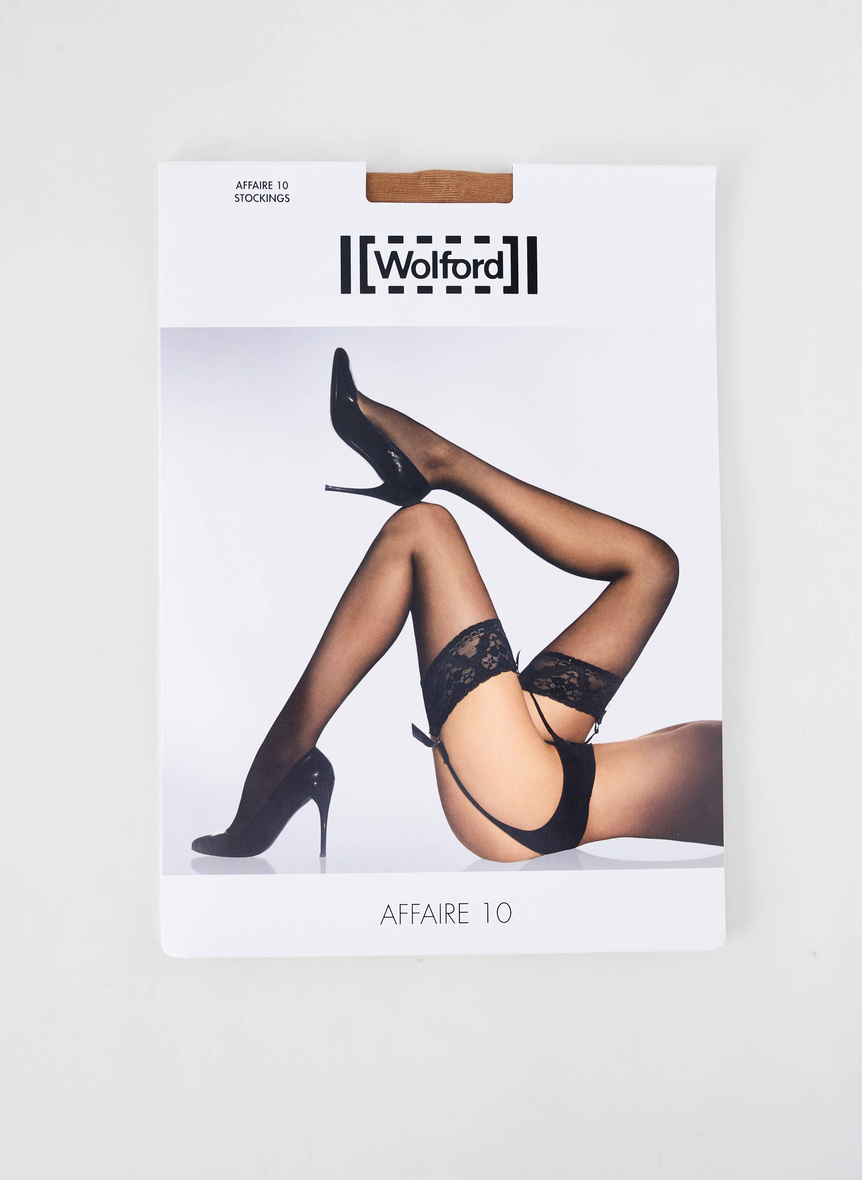 Bas kojinių tvirtinimo dirželių laikymas kremas WOLFORD moteris