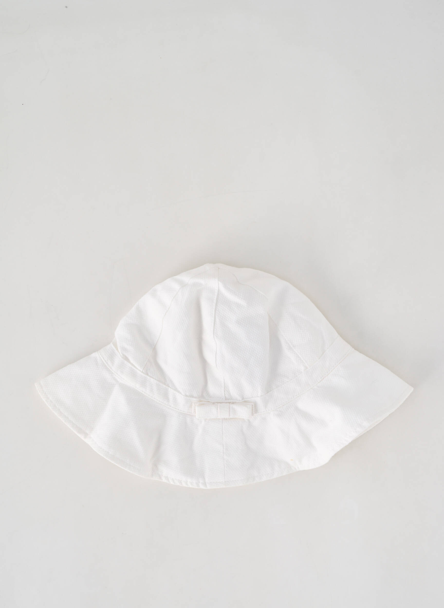 Skrybėlė pamušalas baltas PETIT BATEAU vaikas