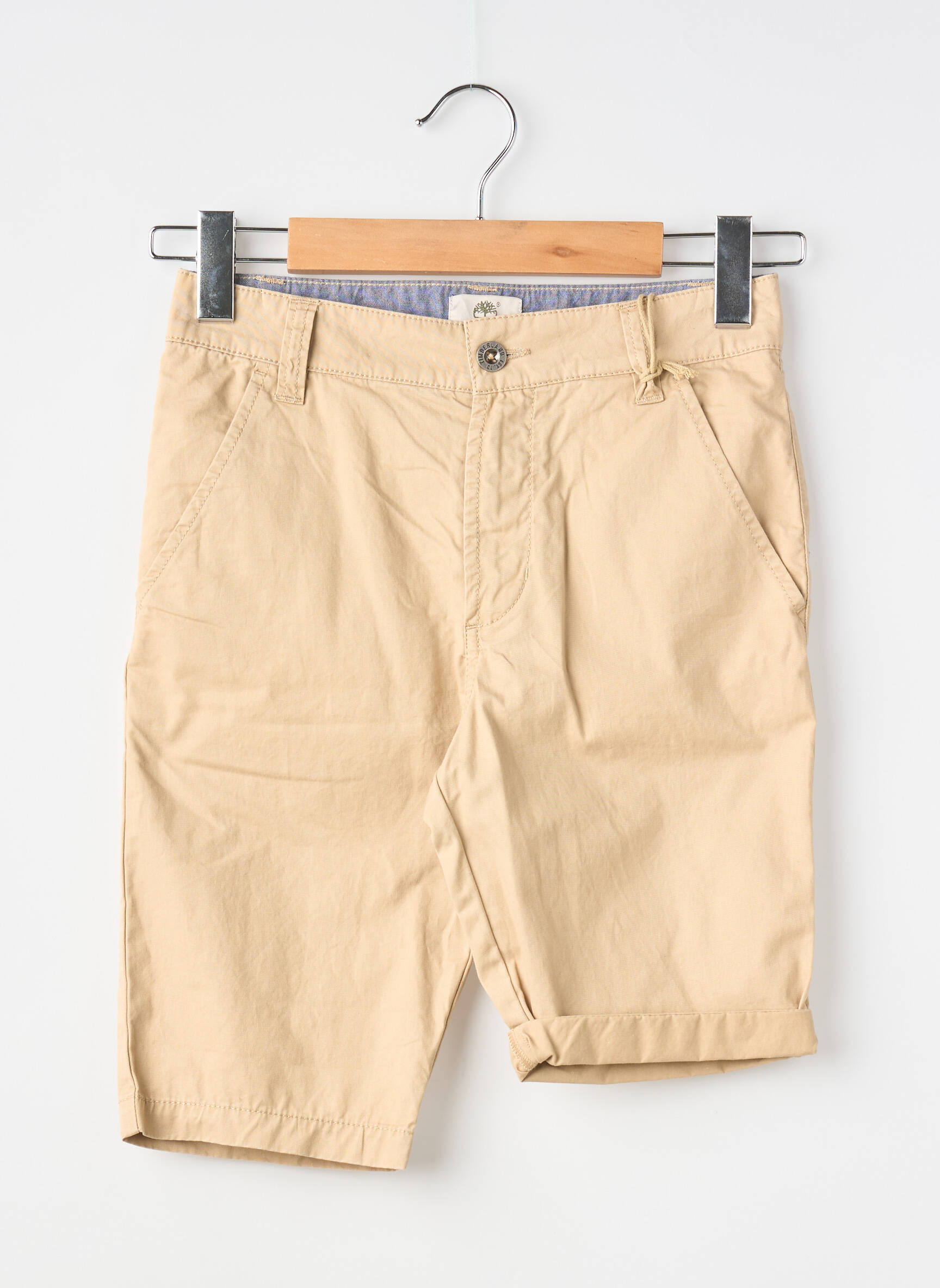 Bermudas popelinos audinys, kuris pasižymi lygiu ir tankiu paviršiumi. rudas TIMBERLAND berniukas