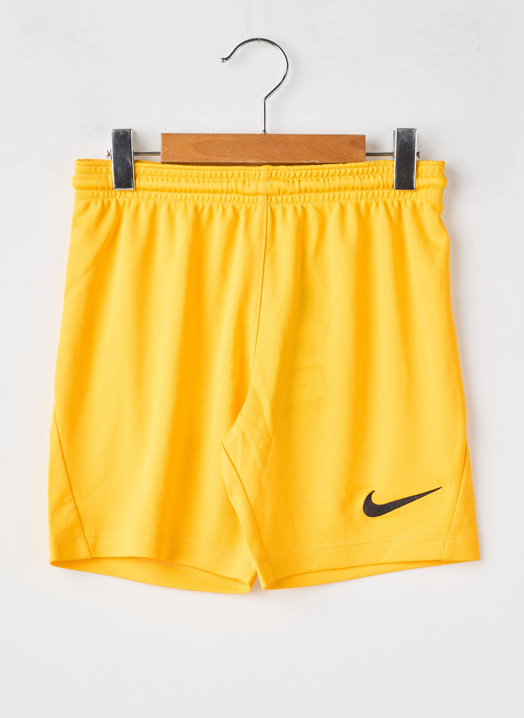 Šortas popelinos audinys, kuris pasižymi lygiu ir tankiu paviršiumi. elastinė dydis geltona NIKE vaikas