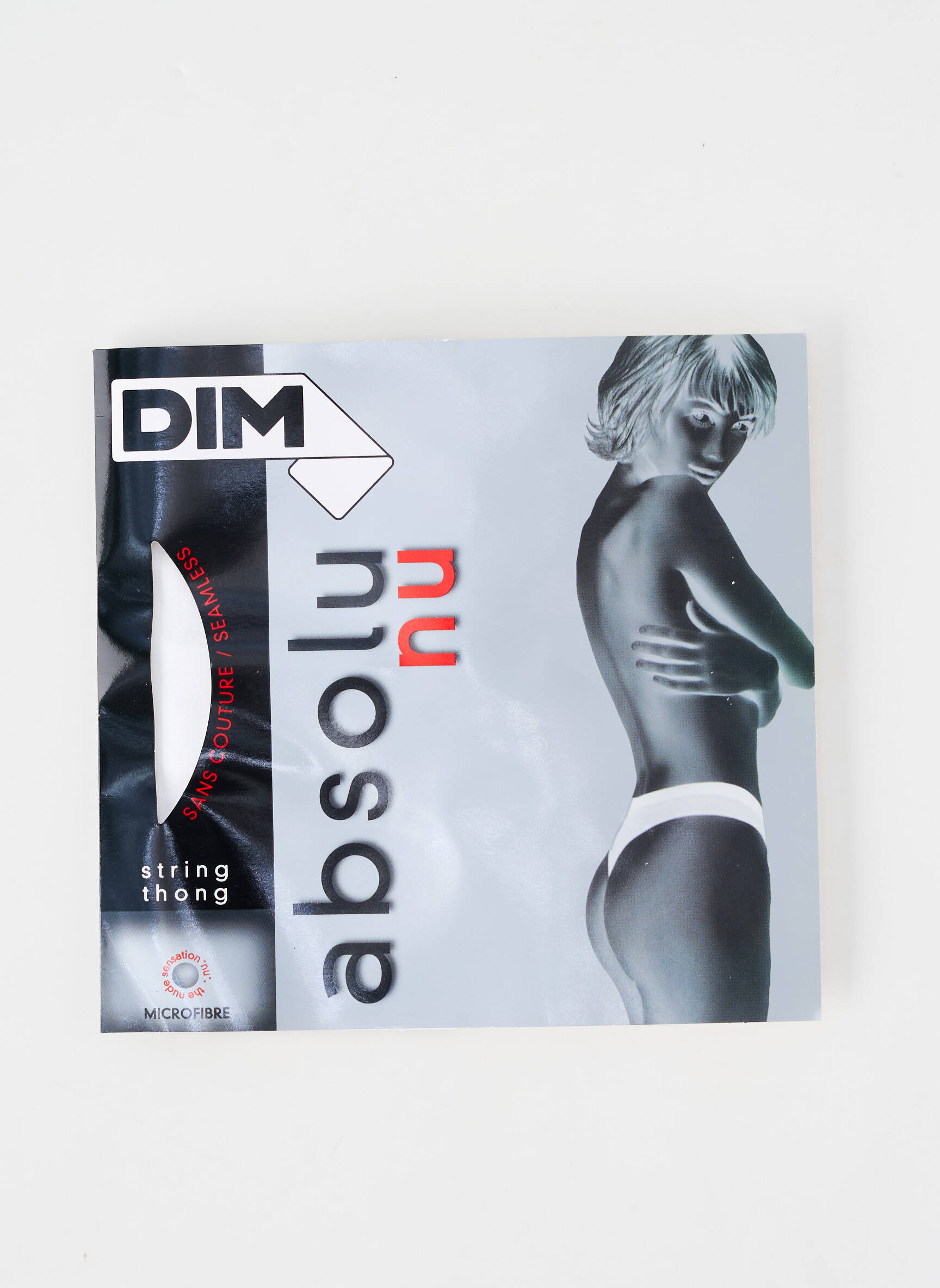 Tanga tamprumas baltas DIM moteris