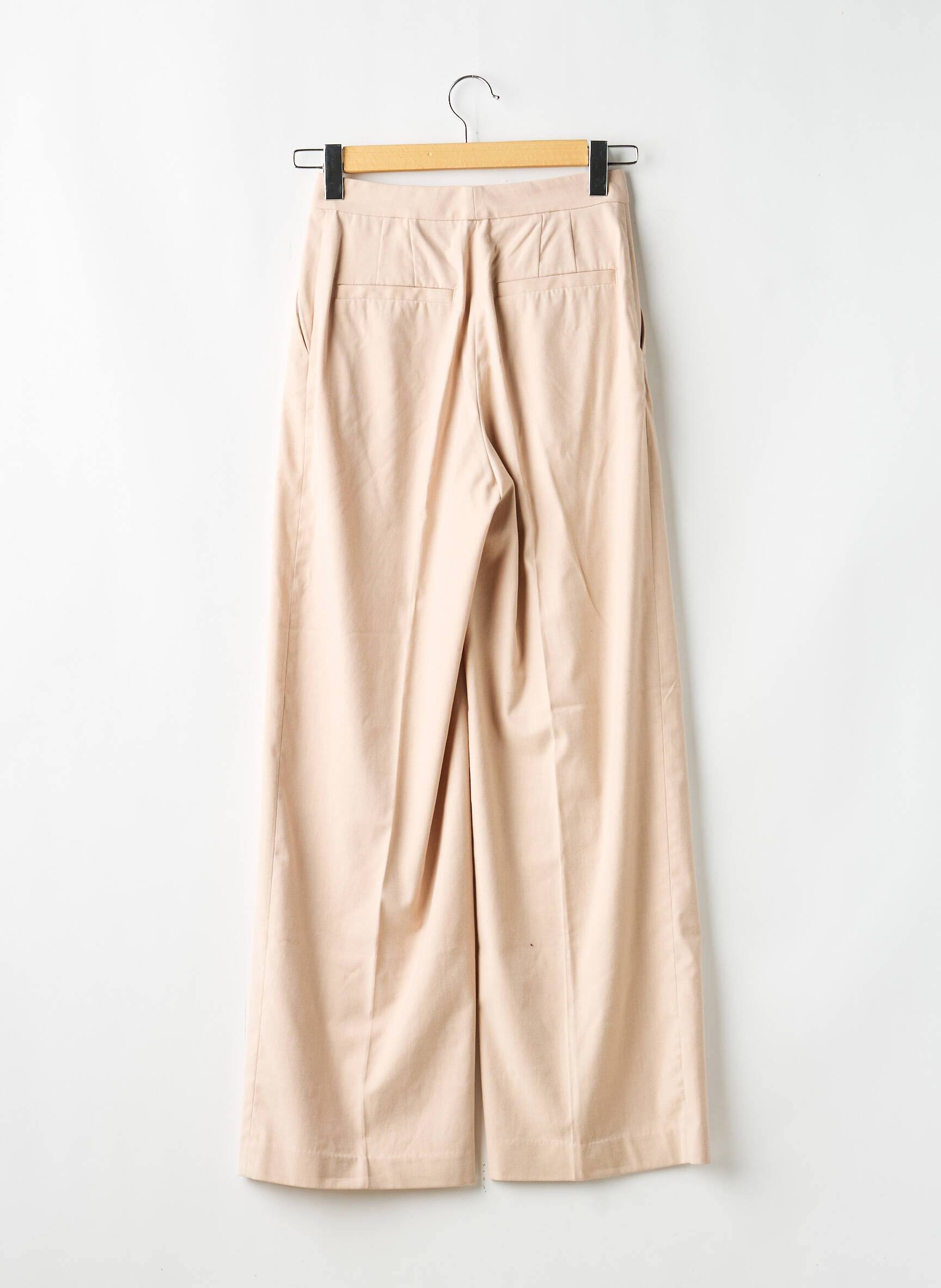Chino kelnė popelinos audinys, kuris pasižymi lygiu ir tankiu paviršiumi. bežinis H&M moteris