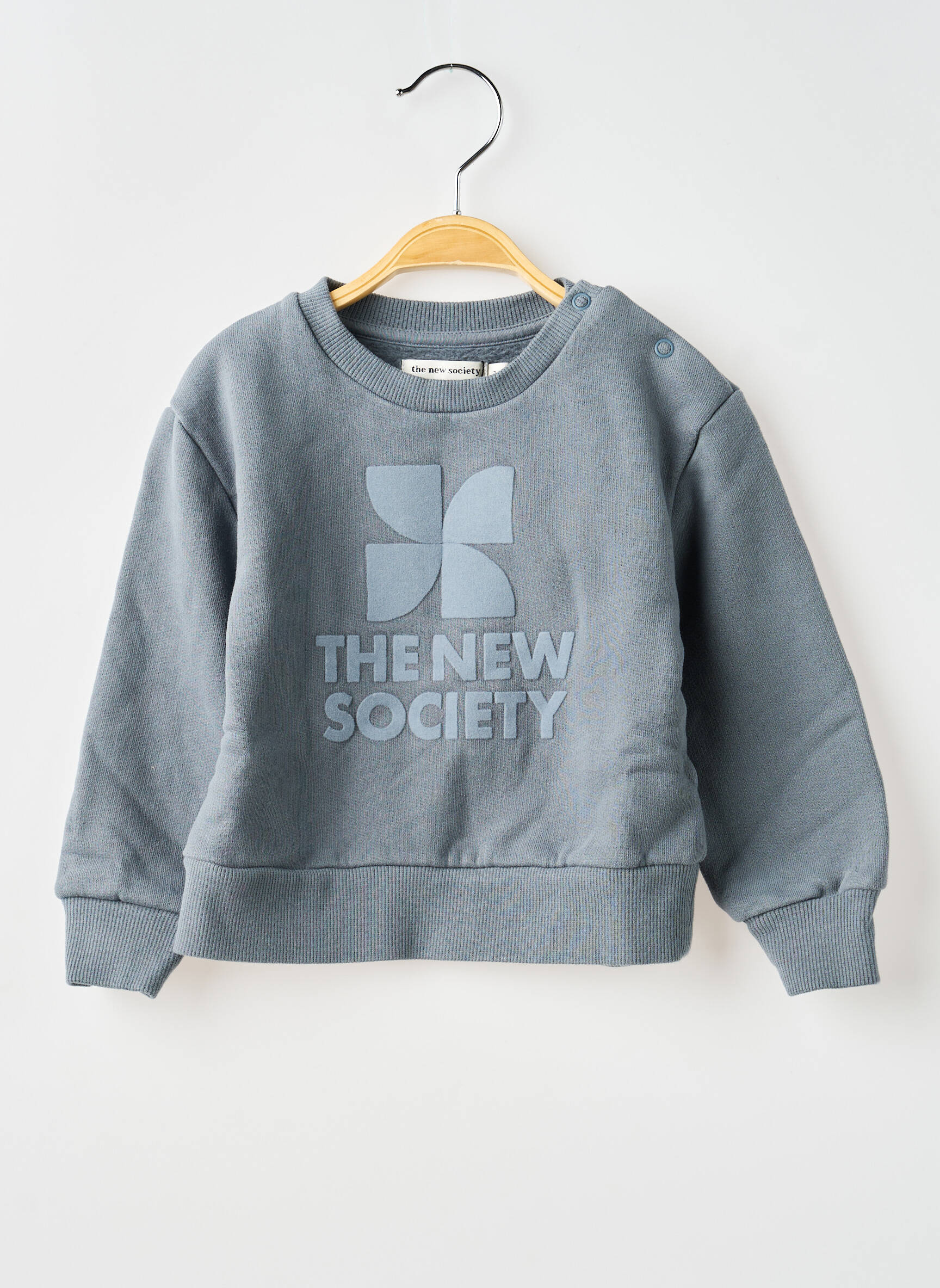Mikroskopas mėlyna THE NEW SOCIETY mergina